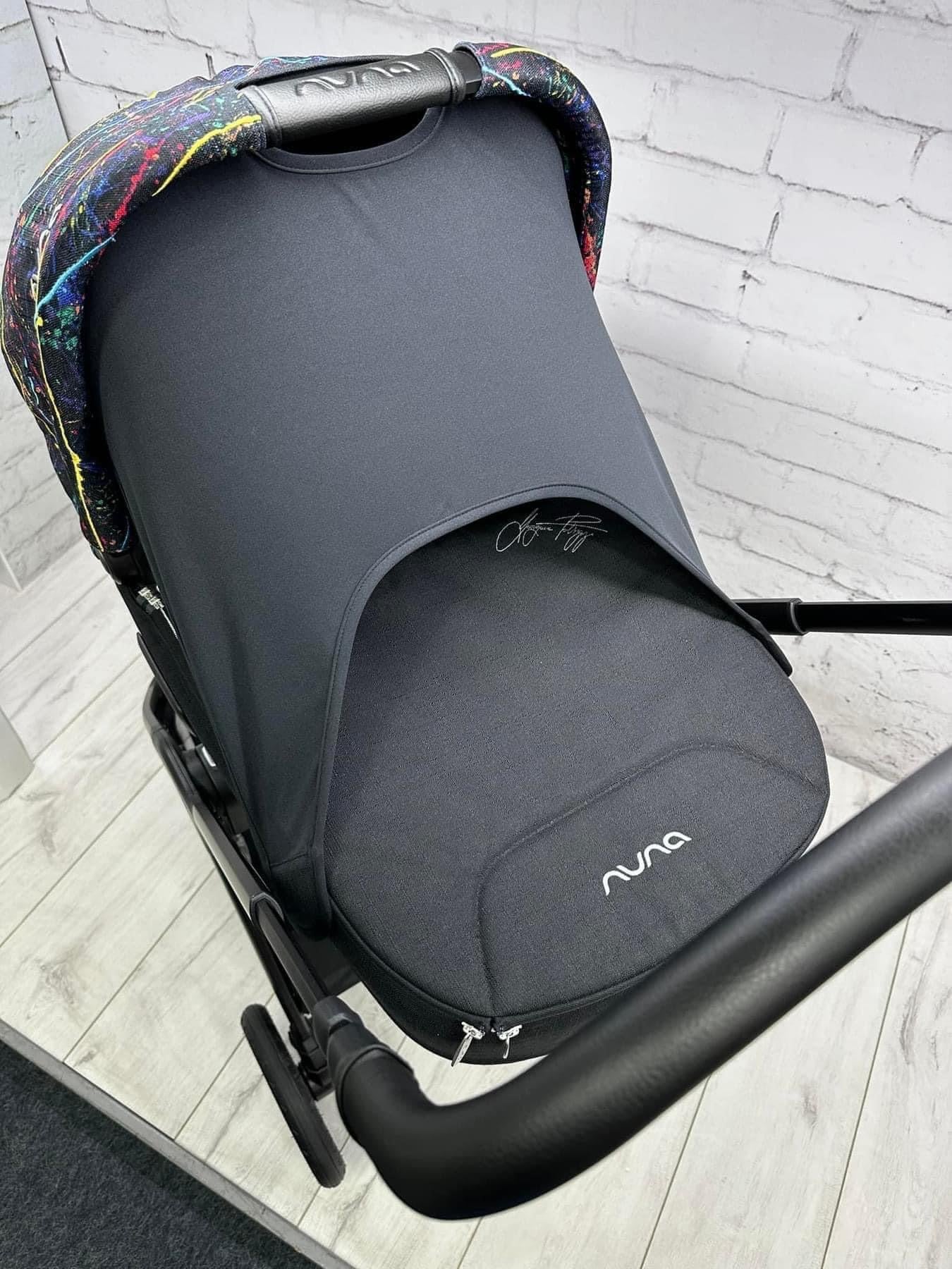 Nuna Triv Next and Cari Carrycot Rainbow Georgette Polizzi Todl and rotating base