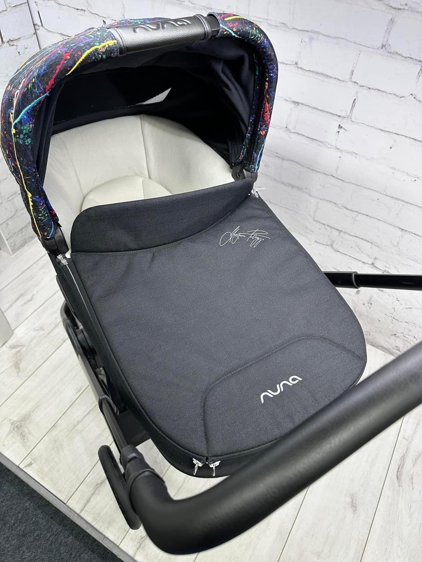 Nuna Triv Next and Cari Carrycot Rainbow Georgette Polizzi Todl and rotating base