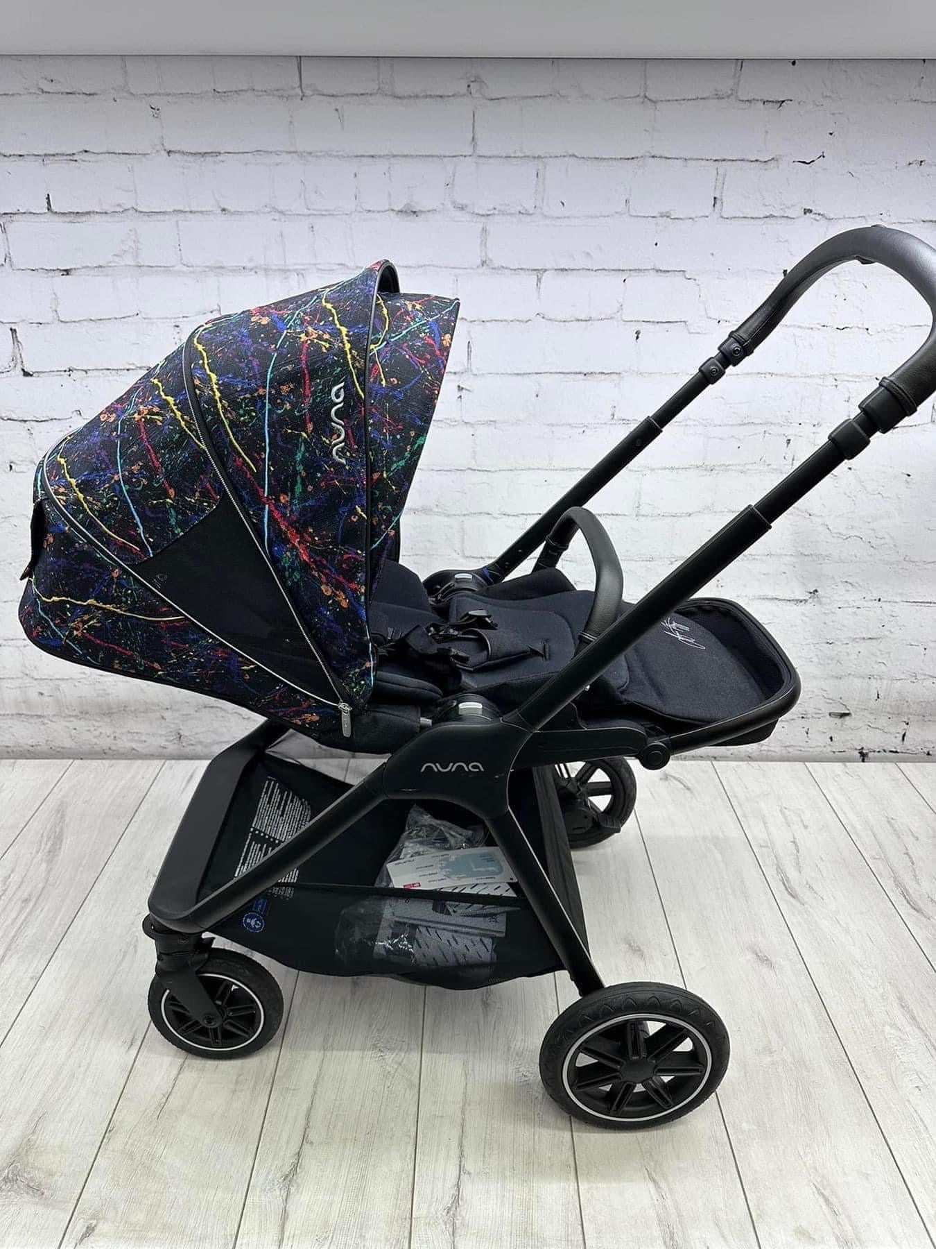 Nuna Triv Next and Cari Carrycot Rainbow Georgette Polizzi Todl and rotating base