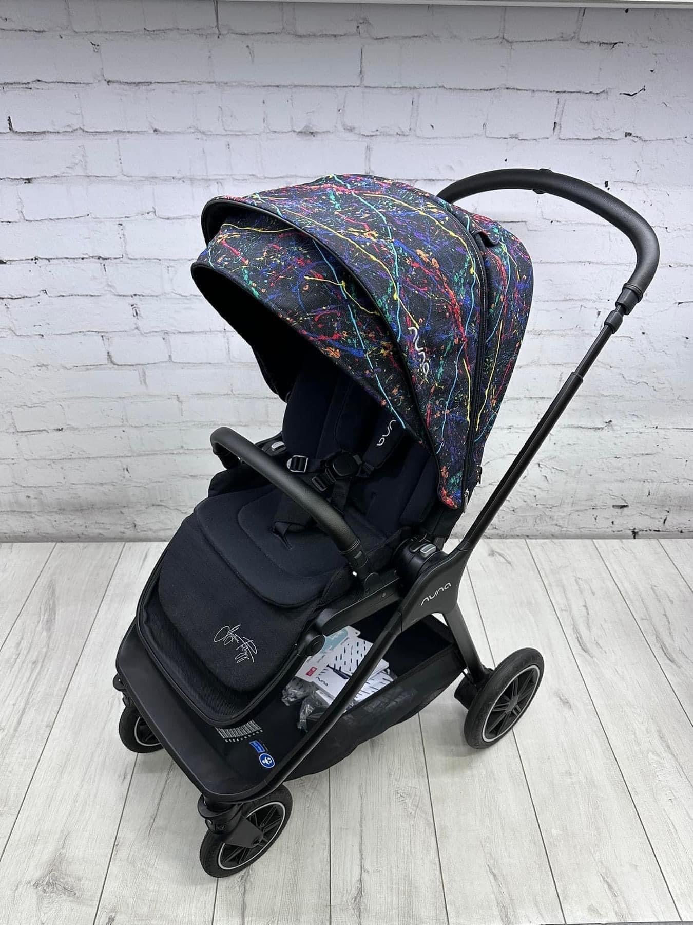 Nuna Triv Next and Cari Carrycot Rainbow Georgette Polizzi Todl and rotating base