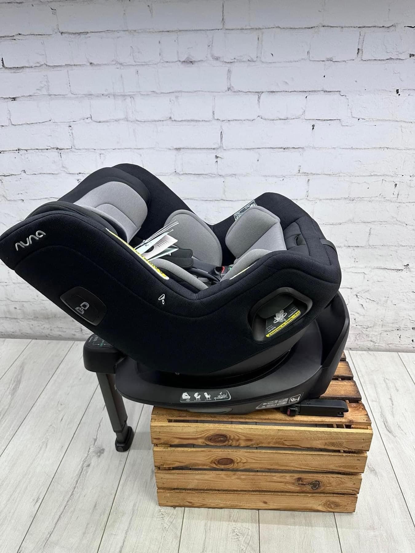 Nuna Triv Next and Cari Carrycot Rainbow Georgette Polizzi Todl and rotating base