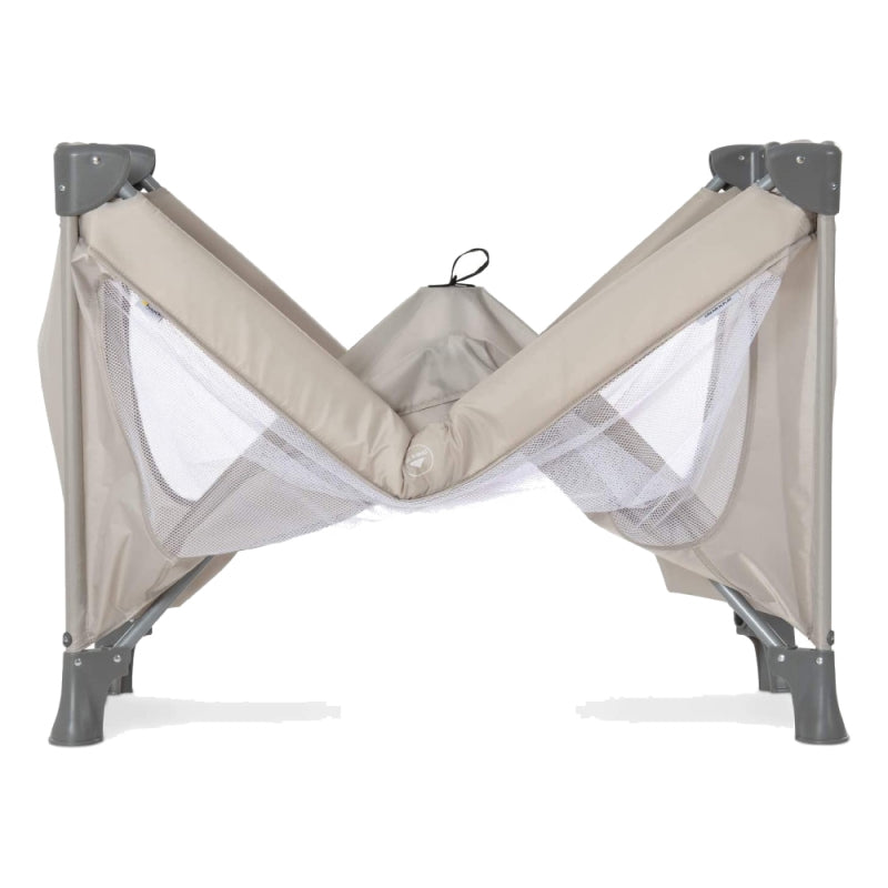 Beige store travel cot